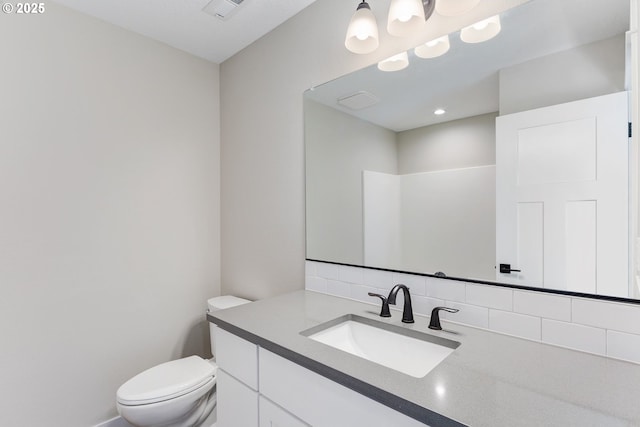 414 Hedin Ter, Gaston, OR 97119 - bathroom with toilet, backsplash, and vanity