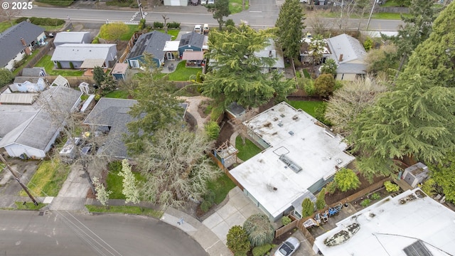 birds eye view of property with a residential view