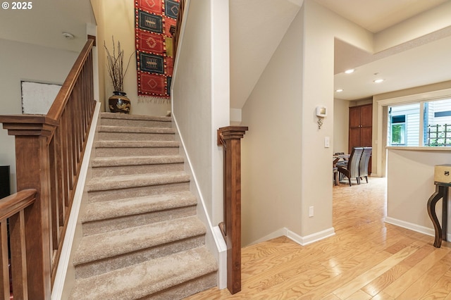 8867 SE 13th Ave, Portland, OR 97202 - stairs with wood finished floors and recessed lighting