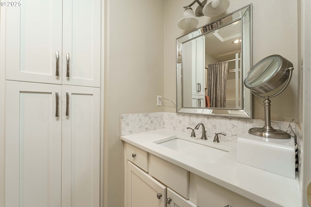 8867 SE 13th Ave, Portland, OR 97202 - full bathroom with vanity and tasteful backsplash
