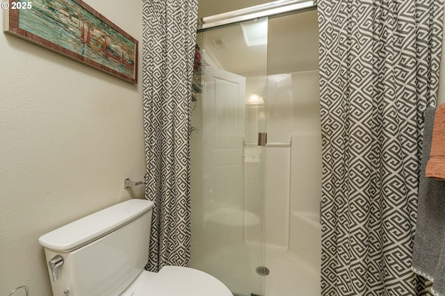 8867 SE 13th Ave, Portland, OR 97202 - bathroom featuring toilet and a stall shower