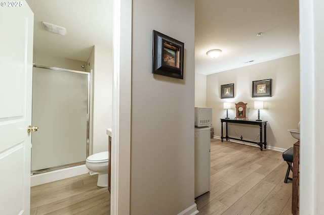 8867 SE 13th Ave, Portland, OR 97202 - full bathroom with wood finished floors and a shower stall