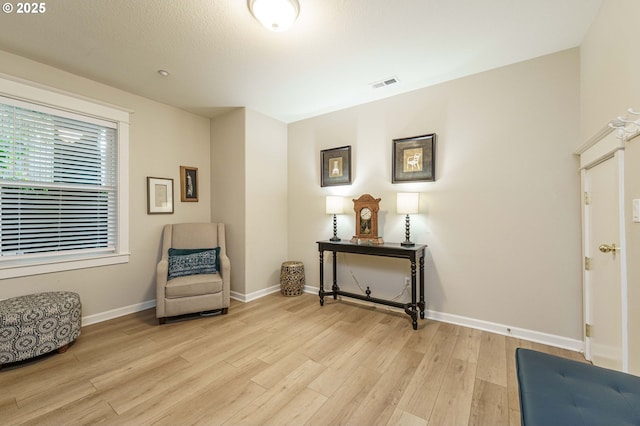 8867 SE 13th Ave, Portland, OR 97202 - living area featuring light wood finished floors and baseboards