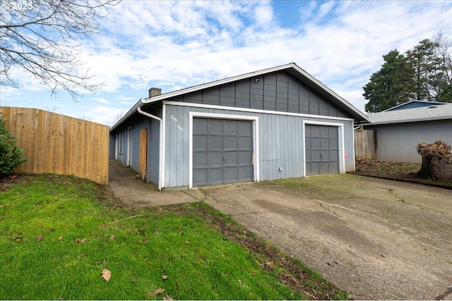 garage with a lawn