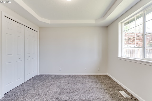 2977 Dry Creek Rd, Eugene, OR 97404 - unfurnished bedroom with carpet floors, a raised ceiling, a closet, and baseboards