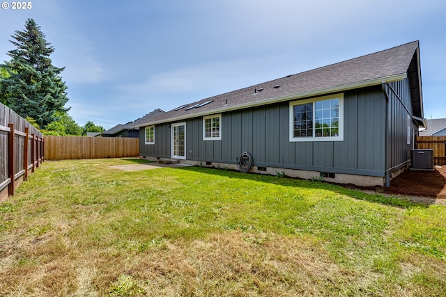 2977 Dry Creek Rd, Eugene, OR 97404 - back of house featuring board and batten siding, roof with shingles, and central AC unit