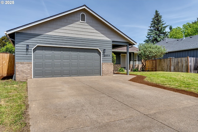 2977 Dry Creek Rd, Eugene, OR 97404 - view of front of house with brick siding and driveway