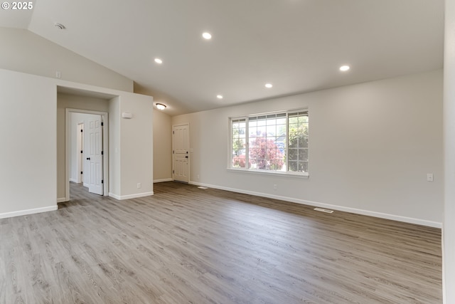 2977 Dry Creek Rd, Eugene, OR 97404 - spare room with wood finished floors, recessed lighting, baseboards, and lofted ceiling