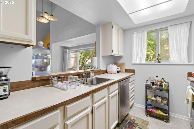 10137 SW Trapper Ter, Beaverton, OR 97008 - kitchen with dishwasher, pendant lighting, and light countertops