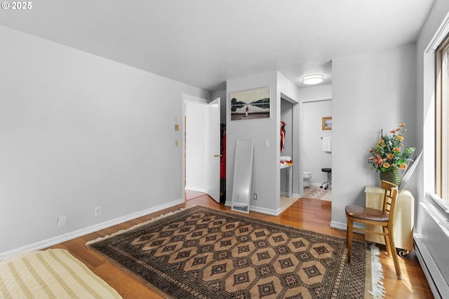 10137 SW Trapper Ter, Beaverton, OR 97008 - bedroom featuring wood finished floors and ensuite bathroom