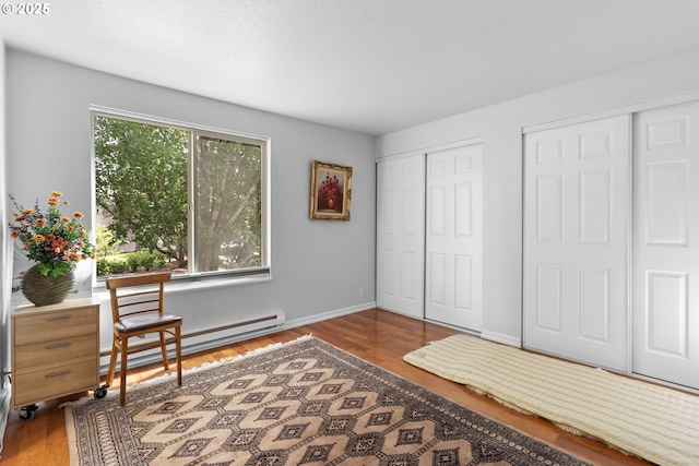10137 SW Trapper Ter, Beaverton, OR 97008 - living area with baseboard heating and wood finished floors