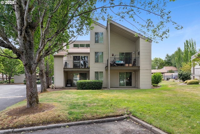 10137 SW Trapper Ter, Beaverton, OR 97008 - mid-century inspired home with a front lawn, uncovered parking, and a balcony