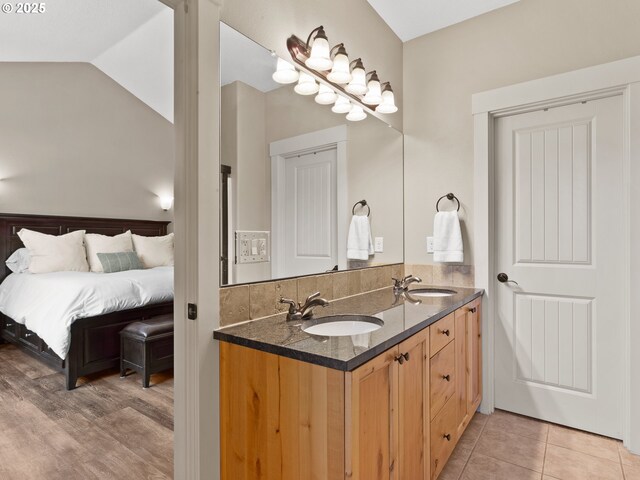 5703 SE 10th St, Gresham, OR 97080 - full bathroom with double vanity, ensuite bath, and lofted ceiling