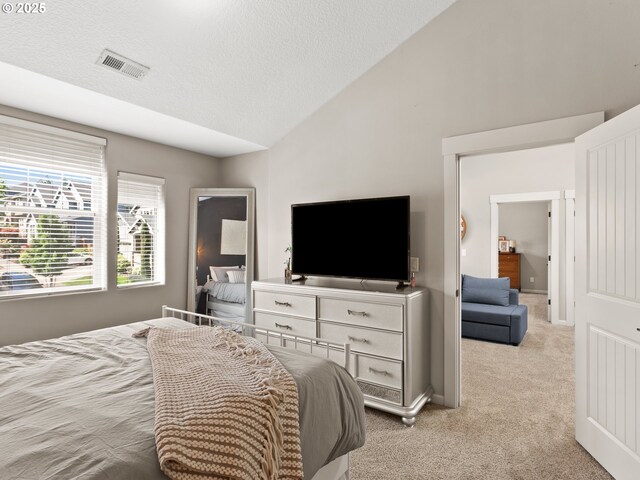 5703 SE 10th St, Gresham, OR 97080 - bedroom with lofted ceiling, light colored carpet, and a textured ceiling