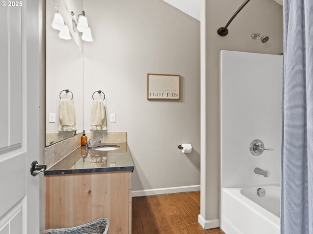 5703 SE 10th St, Gresham, OR 97080 - full bathroom featuring double vanity, shower / bath combo with shower curtain, and wood finished floors