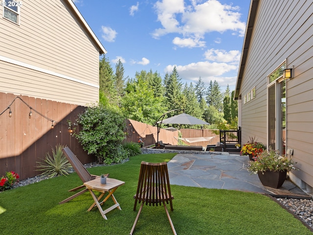 5703 SE 10th St, Gresham, OR 97080 - fenced backyard featuring a patio area