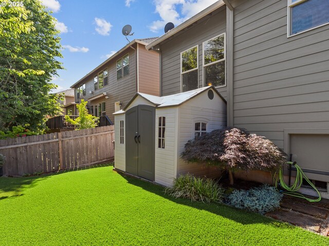 5703 SE 10th St, Gresham, OR 97080 - rear view of property with a storage shed