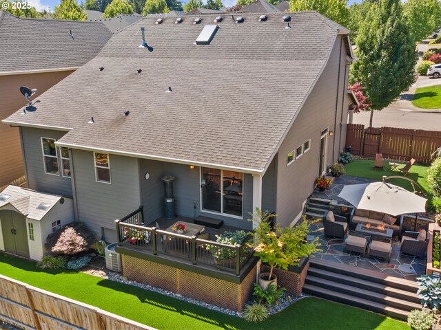 5703 SE 10th St, Gresham, OR 97080 - back of property with outdoor lounge area, a deck, and a shingled roof