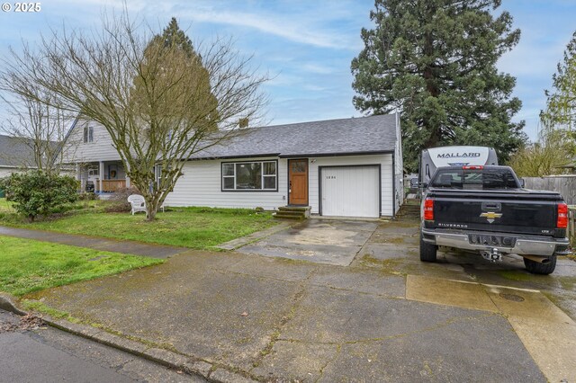 ranch-style home with a garage