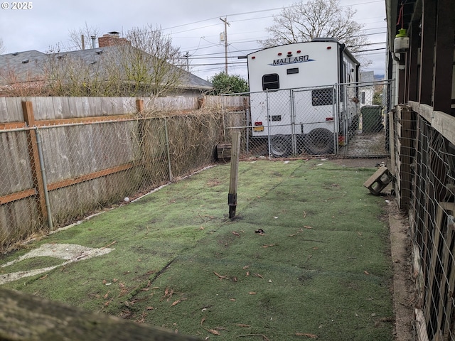 view of yard with a fenced backyard