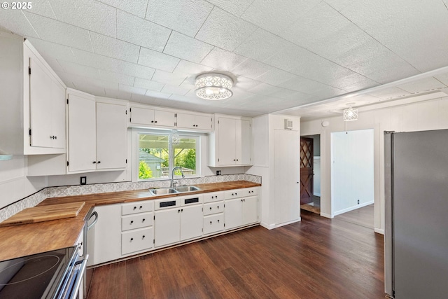 1565 California Ave, Coos Bay, OR 97420 - kitchen with stainless steel appliances, white cabinetry, and dark wood finished floors