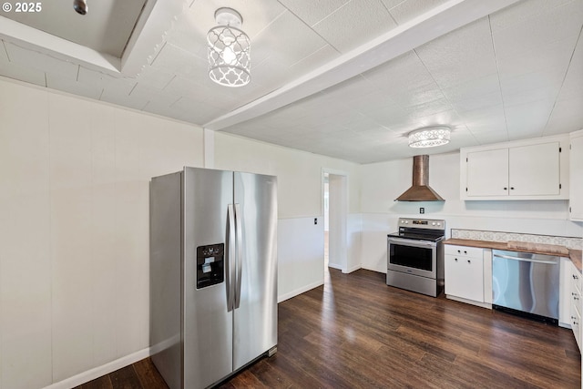 1565 California Ave, Coos Bay, OR 97420 - kitchen with stainless steel appliances, wall chimney exhaust hood, white cabinets, dark wood-style floors, and light countertops