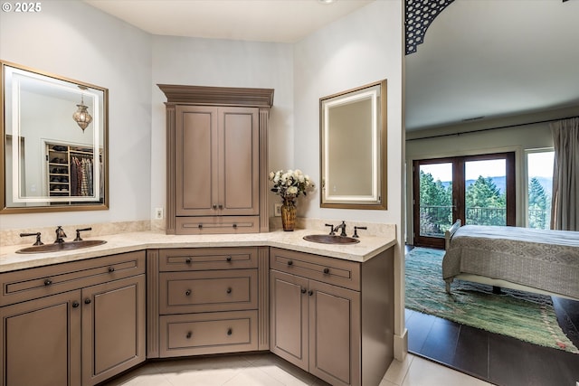 325 Rio Vista Dr, White Salmon, WA 98672 - full bath with a sink, tile patterned floors, and double vanity