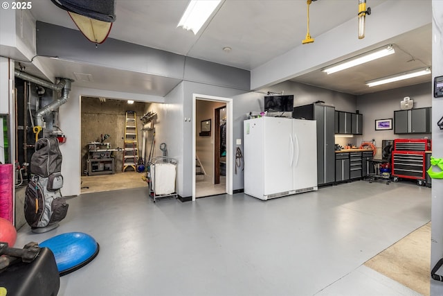 325 Rio Vista Dr, White Salmon, WA 98672 - garage featuring freestanding refrigerator