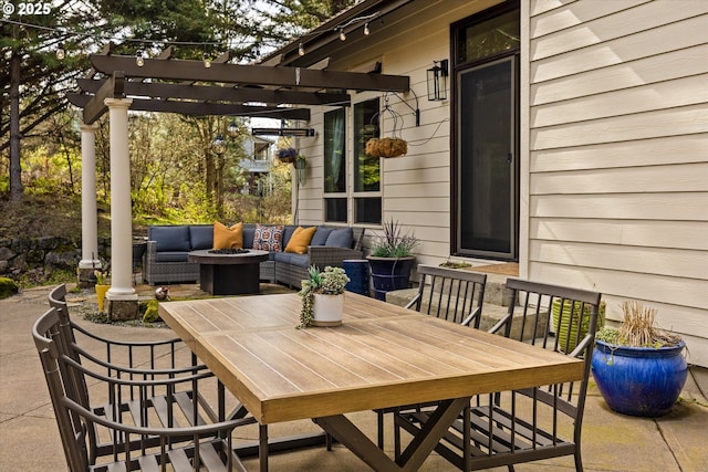 325 Rio Vista Dr, White Salmon, WA 98672 - view of patio / terrace featuring an outdoor living space with a fire pit, outdoor dining space, and a pergola
