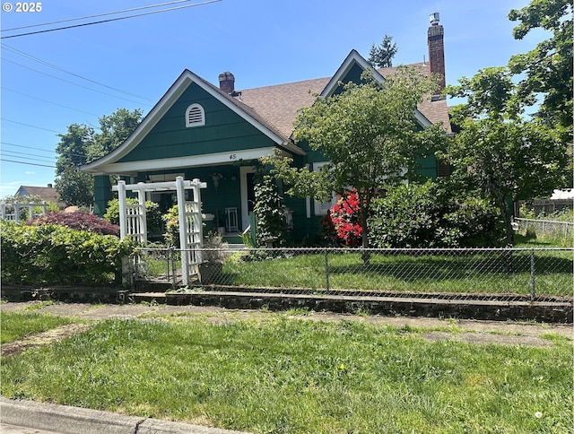 45 S 12th St, Cottage Grove, OR 97424 - view of front of house featuring a chimney and roof with shingles
