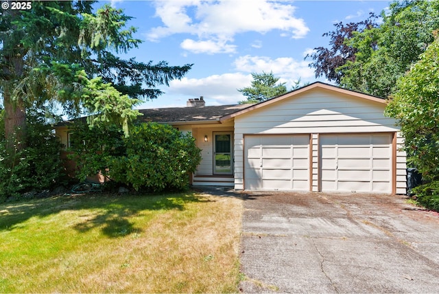 6395 SW Wilson Ave, Beaverton, OR 97008 - view of front of house with a front yard, driveway, a chimney, and a garage