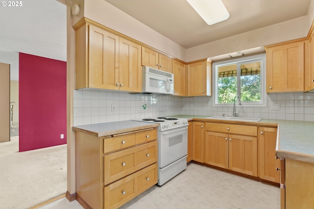 6395 SW Wilson Ave, Beaverton, OR 97008 - kitchen featuring white appliances, light countertops, backsplash, light brown cabinets, and light flooring