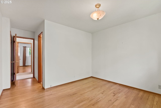 6395 SW Wilson Ave, Beaverton, OR 97008 - empty room with light wood-style flooring and baseboards