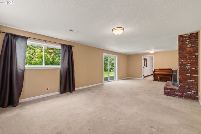 6395 SW Wilson Ave, Beaverton, OR 97008 - unfurnished living room with carpet and a textured ceiling
