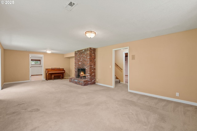 6395 SW Wilson Ave, Beaverton, OR 97008 - unfurnished living room featuring a brick fireplace, light colored carpet, and stairs