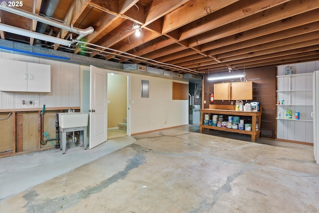 6395 SW Wilson Ave, Beaverton, OR 97008 - unfinished basement featuring a workshop area, heating unit, and electric panel