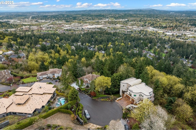 bird's eye view with a forest view