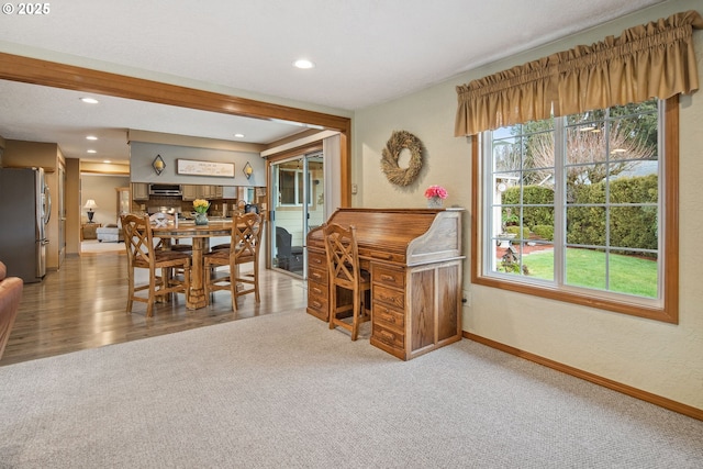 view of carpeted dining space