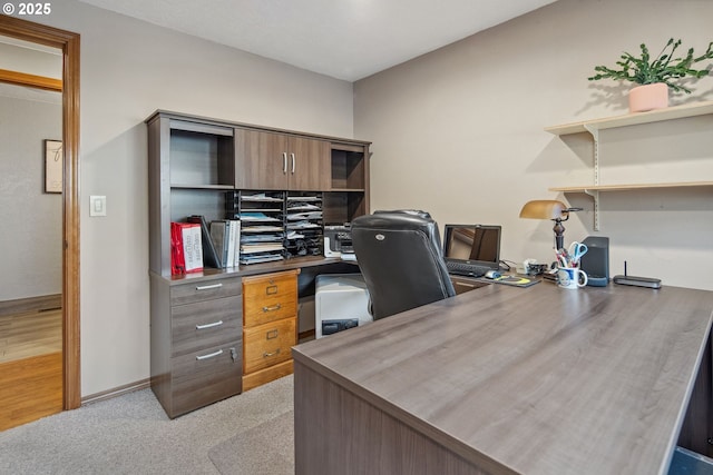 view of carpeted office space