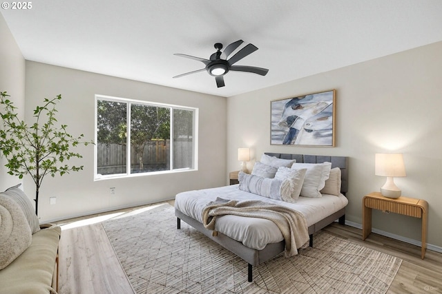 17848 SW Eldred Ln, Sherwood, OR 97140 - bedroom featuring wood finished floors, baseboards, and a ceiling fan