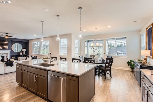 4747 S 17th Dr, Ridgefield, WA 98642 - kitchen with recessed lighting, dishwasher, light wood-type flooring, and a sink