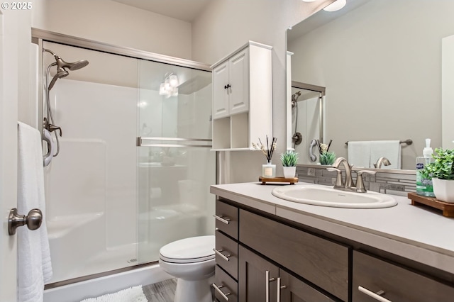 4747 S 17th Dr, Ridgefield, WA 98642 - bathroom featuring toilet, a stall shower, and vanity