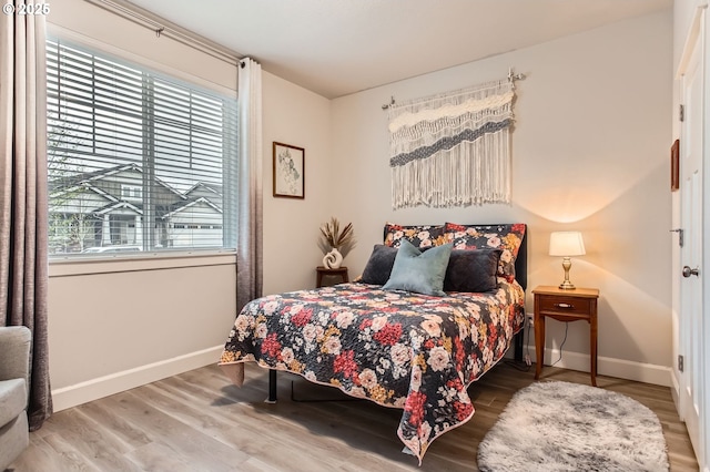 4747 S 17th Dr, Ridgefield, WA 98642 - bedroom featuring wood finished floors and baseboards