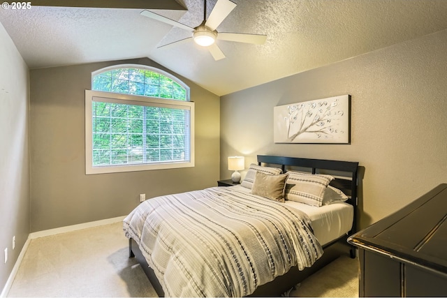 9480 SW 153rd Ave, Beaverton, OR 97007 - carpeted bedroom featuring lofted ceiling, multiple windows, a textured ceiling, ceiling fan, and baseboards