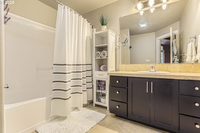 full bathroom featuring tile patterned floors, shower / tub combo with curtain, and vanity