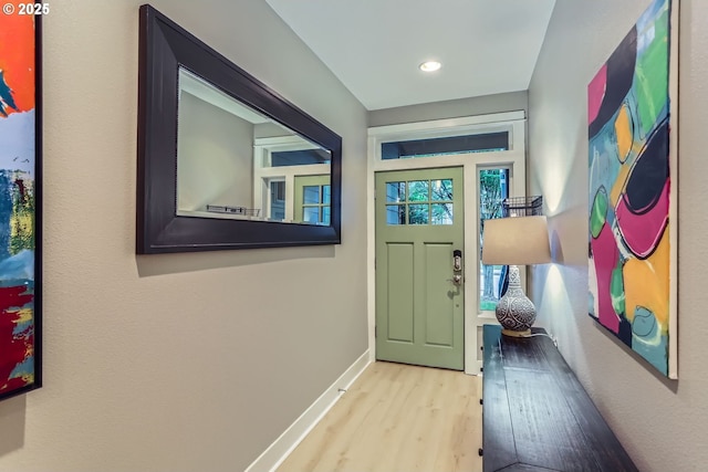 9480 SW 153rd Ave, Beaverton, OR 97007 - doorway to outside featuring wood finished floors, baseboards, and recessed lighting