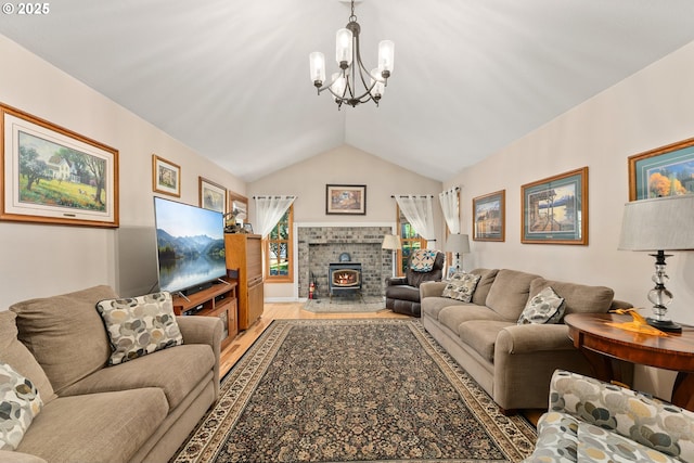 7654 N Bank Rd, Roseburg, OR 97470 - living room featuring a chandelier, vaulted ceiling, and light wood finished floors