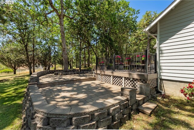 7654 N Bank Rd, Roseburg, OR 97470 - wooden deck featuring a patio