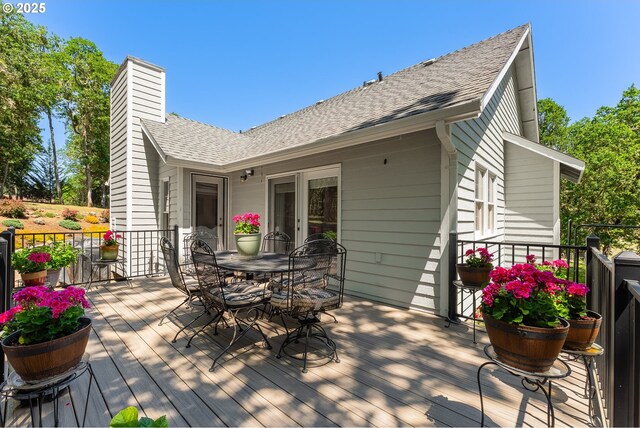 7654 N Bank Rd, Roseburg, OR 97470 - wooden deck featuring outdoor dining area