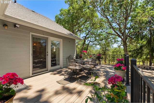 7654 N Bank Rd, Roseburg, OR 97470 - deck with outdoor dining area and french doors